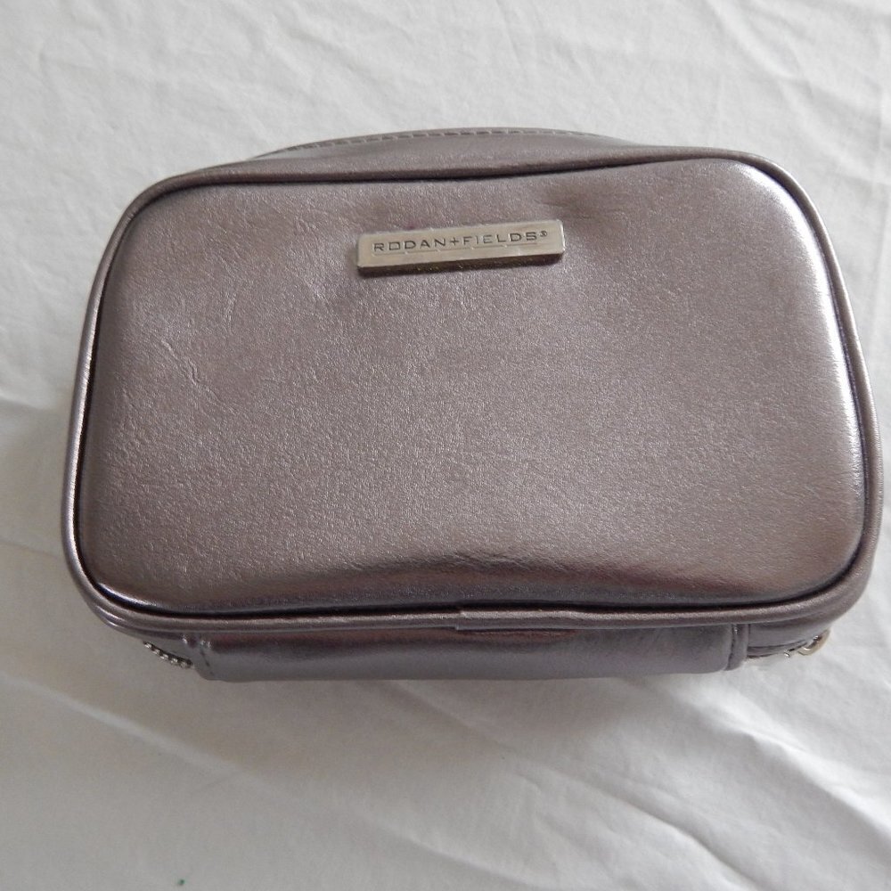 NWOT Rodan & Fields Silver Makeup Bag